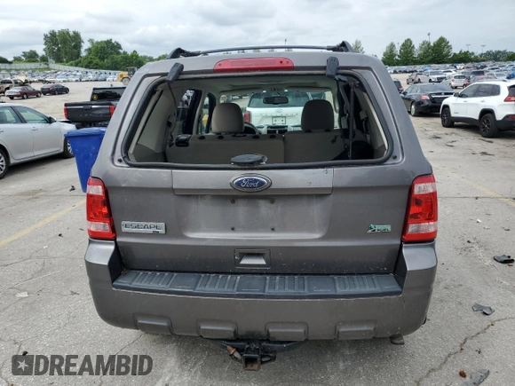 2012 Ford Escape XLT с VIN 1FMCU9DG7CKC03954, выставлен на аукционе Copart как лот 61026785 с пробегом 181 091 миль миль и Списание • Salvage title. История ставок и продаж доступна на DreamBid. Изображение 6.