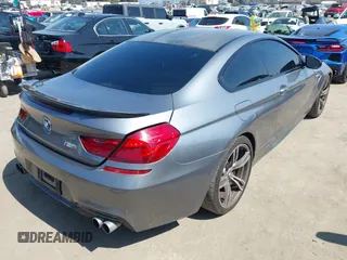 2013 BMW M6 with VIN WBSLX9C51DC968593, listed as a IAAI auction lot 42465979 with 88,010 mi miles and . Bid and sale history available at DreamBid. Image 4.