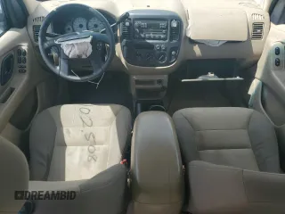 2004 Ford Escape with VIN 1FMCU02184KB21677, listed as a Copart auction lot 58401445 with 102,508 mi miles and Salvage title. Bid and sale history available at DreamBid. Image 8.