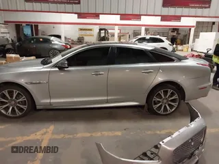 2015 Jaguar XJ with VIN SAJWA1CZ8F8V83873, listed as a IAAI auction lot 41271111 with 94,830 mi miles. Bid and sale history available at carsss.com. Image 15.