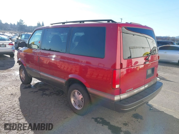 1999 Chevrolet Astro with VIN 1GNEL19W6XB104010, listed as a IAAI auction lot 41403240 with 96,904 mi miles. Bid and sale history available at carsss.com. Image 3.