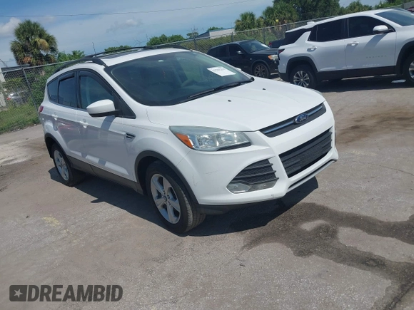 2013 Ford Escape SE with VIN 1FMCU0GX5DUA85464, listed as a IAAI auction lot 42701315 with 158,093 mi miles and . Bid and sale history available at DreamBid. Image 1.