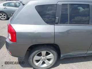 2011 Jeep Compass Latitude with VIN 1J4NT1FB4BD246549, listed as a IAAI auction lot 42156761 with 232,739 mi miles. Bid and sale history available at carsss.com. Image 14.
