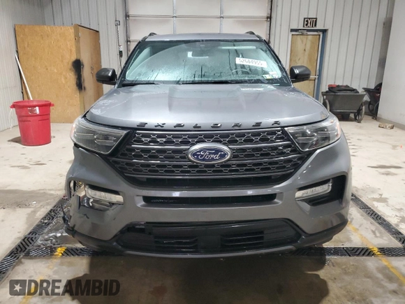 2021 Ford Explorer XLT with VIN 1FMSK8DHXMGA22114, listed as a Copart auction lot 52604955 with 212,538 mi miles and Salvage Title. Bid and sale history available at carsss.com. Image 5.