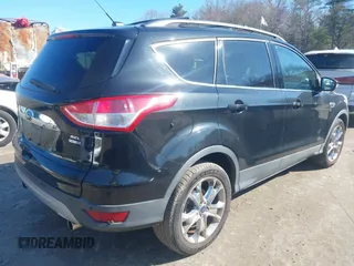 2013 Ford Escape SEL with VIN 1FMCU9HX3DUC18192, listed as a IAAI auction lot 41974404 with 61,054 mi miles. Bid and sale history available at carsss.com. Image 4.