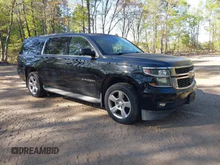 2015 Chevrolet Suburban LT with VIN 1GNSKJKC0FR238524, listed as a IAAI auction lot 42046889 with 179,676 mi miles. Bid and sale history available at carsss.com. Image 1.