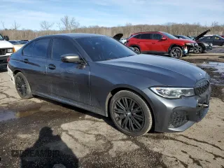 2020 BMW 3 Series M340i xDrive with VIN WBA5U9C02LFH17348, listed as a Copart auction lot 45452545 with 56,869 mi miles and Salvage Title. Bid and sale history available at DreamBid. Image 4.