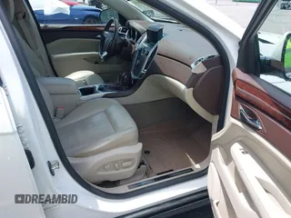 2011 Cadillac SRX Luxury Collection z VIN 3GYFNAEY2BS527043, wystawiony jako IAAI lot #42234641 z przebiegiem 114 769 mil mil oraz . Historia ofert i sprzedaży dostępna na DreamBid. Obrazek 5.