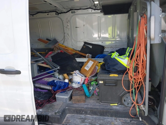 2015 Ford Transit with VIN 1FTNE2YM7FKB00894, listed as a IAAI auction lot 42088996 with 199,321 mi miles and . Bid and sale history available at DreamBid. Image 8.