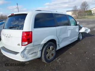 2019 Dodge Grand Caravan SXT with VIN 2C4RDGCG4KR771745, listed as a IAAI auction lot 41859267 with 97,436 mi miles and . Bid and sale history available at DreamBid. Image 4.