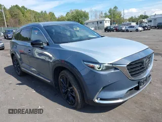 2021 Mazda CX-9 Grand Touring with VIN JM3TCBDY4M0521221, listed as a IAAI auction lot 40518124 with 36,460 mi miles and . Bid and sale history available at carsss.com. Image 1.