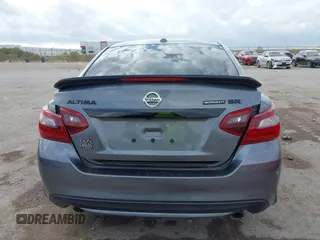 2018 Nissan Altima 2.5 S with VIN 1N4AL3AP9JC288485, listed as a IAAI auction lot 40718406 with 106,819 mi miles. Bid and sale history available at carsss.com. Image 16.