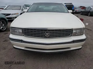 1995 Cadillac Concours z VIN 1G6KF52Y3SU270555, wystawiony jako Copart lot #76318254 z przebiegiem Nie podano mil oraz Szkody całkowita. Historia ofert i sprzedaży dostępna na DreamBid. Obrazek 5.