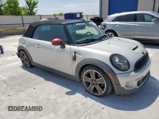2013 MINI Convertible S с VIN WMWZP3C57DT705259, выставлен на аукционе Copart как лот 59954795 с пробегом 132 988 миль миль и Списание • Salvage title. История ставок и продаж доступна на DreamBid. Изображение 4.