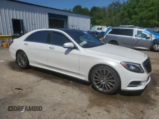2015 Mercedes-Benz S 550 with VIN WDDUG8CBXFA157214, listed as a Copart auction lot 52240005 with 118,334 mi miles and Salvage Title. Bid and sale history available at DreamBid. Image 4.