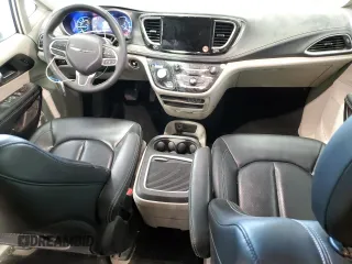 2023 Chrysler Pacifica Hybrid Touring L with VIN 2C4RC1L75PR611607, listed as a Copart auction lot 61475985 with 63,241 mi miles and Clean title. Bid and sale history available at DreamBid. Image 8.