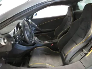 2016 McLaren 650S z VIN SBM11FAA1GW006061, wystawiony jako Copart lot #58605735 z przebiegiem 16 999 mil mil oraz Szkody całkowita. Historia ofert i sprzedaży dostępna na DreamBid. Obrazek 9.