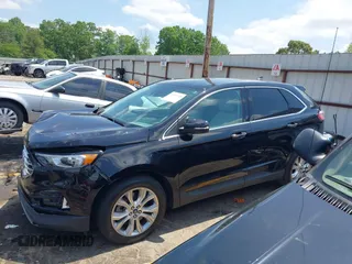 2021 Ford Edge Titanium z VIN 2FMPK3K96MBA16046, wystawiony jako IAAI lot #42137419 z przebiegiem 88 622 mil mil oraz . Historia ofert i sprzedaży dostępna na DreamBid. Obrazek 14.