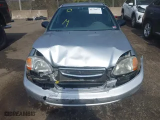 1996 Honda Civic DX with VIN 2HGEJ6627TH550103, listed as a IAAI auction lot 41710877 with 142,608 mi miles. Bid and sale history available at carsss.com. Image 12.