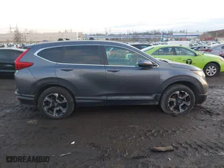 2017 Honda CR-V Touring with VIN 2HKRW2H94HH617081, listed as a IAAI auction lot 41294254 with 145,140 mi miles. Bid and sale history available at carsss.com. Image 13.