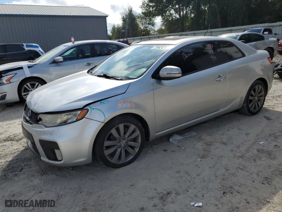 2011 Kia Forte Koup SX with VIN KNAFW6A32B5369644, listed as a Copart auction lot 73962474 with 172864 miles and Salvage Title. Bid and sale history available at carsss.com. Image 1.