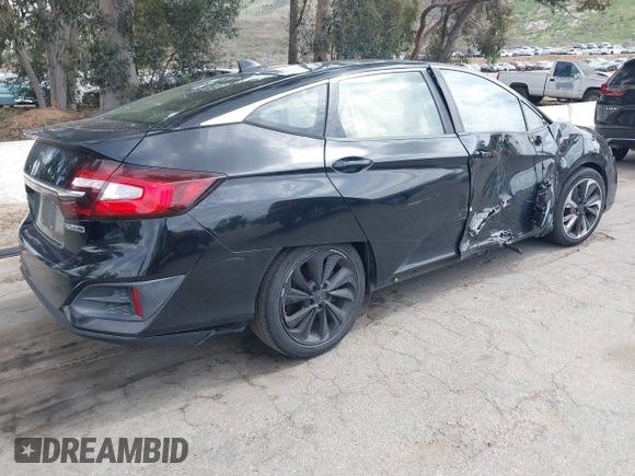 2018 Honda Clarity Plug-In Hybrid with VIN JHMZC5F10JC014054, listed as a IAAI auction lot 41932195 with 100,643 mi miles. Bid and sale history available at carsss.com. Image 4.