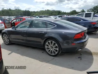 2015 Audi A7 3.0 TDI Premium Plus with VIN WAUWMAFC4FN002784, listed as a Copart auction lot 69375644 with 65,802 mi miles and Salvage Title. Bid and sale history available at carsss.com. Image 2.