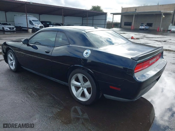 2013 Dodge Challenger R/T with VIN 2C3CDYBT8DH557140, listed as a IAAI auction lot 41579965 with 120,804 mi miles. Bid and sale history available at carsss.com. Image 3.