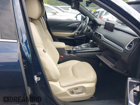 2021 Mazda CX-9 Carbon Edition with VIN JM3TCADY1M0516505, listed as a IAAI auction lot 42016644 with 50,900 mi miles and . Bid and sale history available at carsss.com. Image 5.