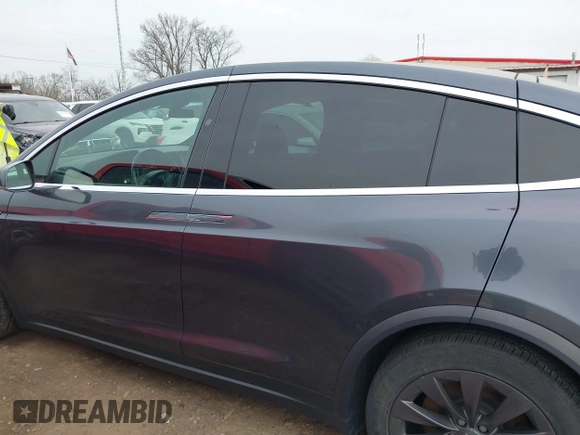 2019 Tesla Model X 75D with VIN 5YJXCDE24KF152150, listed as a IAAI auction lot 42015311 with 1 mi miles. Bid and sale history available at carsss.com. Image 14.