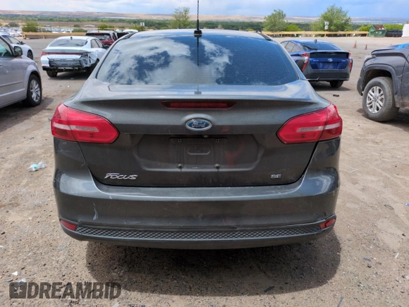 2015 Ford Focus SE with VIN 1FADP3F29FL328828, listed as a Copart auction lot 56420505 with 149,675 mi miles and Salvage title. Bid and sale history available at DreamBid. Image 6.