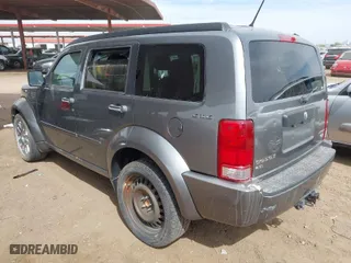 2011 Dodge Nitro Heat with VIN 1D4PU4GX2BW607498, listed as a IAAI auction lot 41685631 with 124,556 mi miles. Bid and sale history available at carsss.com. Image 3.