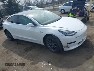 2020 Tesla Model 3 Standard Range Plus z VIN 5YJ3E1EA2LF634678, wystawiony jako IAAI lot #41836804 z przebiegiem 112 725 mil mil oraz . Historia ofert i sprzedaży dostępna na DreamBid. Obrazek 1.