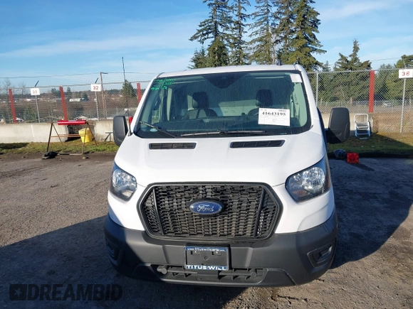 2021 Ford Transit Cargo z VIN 1FTYE1Y89MKA16809, wystawiony jako IAAI lot #41643195 z przebiegiem 7 407 mil mil oraz . Historia ofert i sprzedaży dostępna na DreamBid. Obrazek 12.