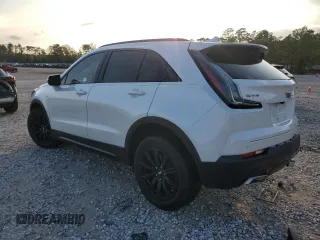2022 Cadillac XT4 FWD Sport with VIN 1GYFZER48NF169913, listed as a Copart auction lot 84457034 with 36,406 mi miles and Clean title. Bid and sale history available at DreamBid. Image 2.