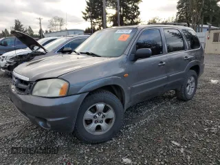 2004 Mazda Tribute ES with VIN 4F2CZ96104KM09777, listed as a Copart auction lot 87602135 with 282,858 mi miles and Salvage Title. Bid and sale history available at carsss.com. Image 1.