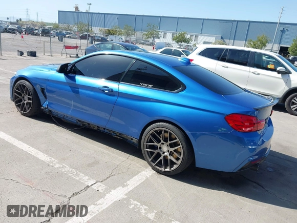 2015 BMW 4 Series 435i with VIN WBA3R1C50FF774588, listed as a IAAI auction lot 42001394 with 96,400 mi miles and . Bid and sale history available at carsss.com. Image 3.