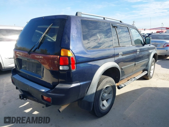 2002 Mitsubishi Montero ES z VIN JA4LS21H02J040318, wystawiony jako IAAI lot #41272566 z przebiegiem 278 339 mil mil oraz . Historia ofert i sprzedaży dostępna na DreamBid. Obrazek 4.