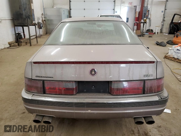 1995 Cadillac Seville Luxury SLS with VIN 1G6KS52Y9SU814813, listed as a Copart auction lot 75337324 with 214,882 mi miles and Clean Title. Bid and sale history available at carsss.com. Image 6.