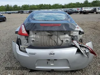 2020 Nissan 370Z Sport z VIN JN1AZ4EH6LM820552, wystawiony jako Copart lot #55721215 z przebiegiem 50 002 mil mil oraz Szkody całkowita. Historia ofert i sprzedaży dostępna na DreamBid. Obrazek 6.