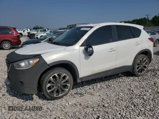2016 Mazda CX-5 Grand Touring z VIN JM3KE4DY7G0864109, wystawiony jako Copart lot #59635865 z przebiegiem Nie podano mil oraz Czysty tytuł • Clean title. Historia ofert i sprzedaży dostępna na DreamBid. Obrazek 1.