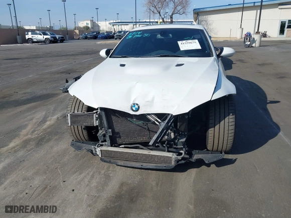 2011 BMW M3 with VIN WBSKG9C57BE646148, listed as a IAAI auction lot 41559675 with 90,333 mi miles. Bid and sale history available at carsss.com. Image 6.