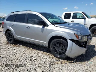 2017 Dodge Journey SXT with VIN 3C4PDCBB9HT522532, listed as a Copart auction lot 55886535 with 201,594 mi miles and Salvage title. Bid and sale history available at DreamBid. Image 4.