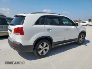 2012 Kia Sorento EX z VIN 5XYKU4A64CG271617, wystawiony jako Copart lot #64901615 z przebiegiem 127 061 mil mil oraz Czysty tytuł • Clean title. Historia ofert i sprzedaży dostępna na DreamBid. Obrazek 3.