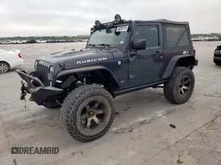 2016 Jeep Wrangler Rubicon z VIN 1C4BJWCGXGL236519, wystawiony jako Copart lot #50650165 z przebiegiem 51 689 mil mil oraz Szkoda całkowita • Salvage title. Historia ofert i sprzedaży dostępna na DreamBid. Obrazek 1.