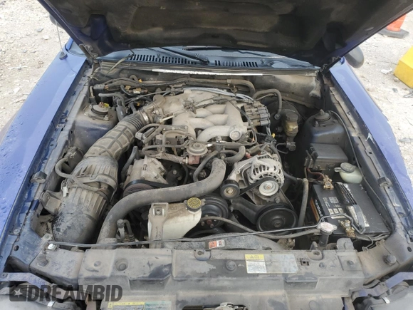 2004 Ford Mustang Deluxe with VIN 1FAFP444X4F107575, listed as a Copart auction lot 60908705 with 148,467 mi miles and Salvage title. Bid and sale history available at DreamBid. Image 11.