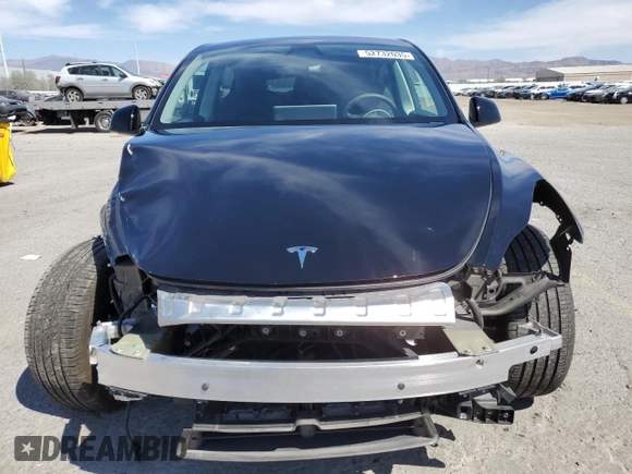2024 Tesla Model Y Long Range z VIN 7SAYGAEE3RF089122, wystawiony jako Copart lot #52732035 z przebiegiem 15 486 mil mil oraz Szkoda całkowita • Salvage title. Historia ofert i sprzedaży dostępna na DreamBid. Obrazek 5.