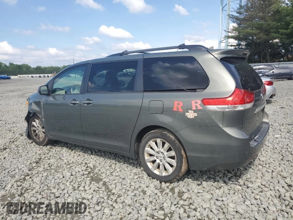 2011 Toyota Sienna XLE AAS with VIN 5TDYK3DC5BS094699, listed as a Copart auction lot 61583905 with 245,035 mi miles and Salvage title. Bid and sale history available at DreamBid. Image 2.