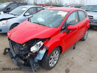 2012 Ford Fiesta SE with VIN 3FADP4EJ5CM170268, listed as a IAAI auction lot 42023185 with 106,659 mi miles. Bid and sale history available at carsss.com. Image 2.