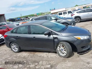 2018 Ford Focus SE with VIN 1FADP3F20JL312395, listed as a IAAI auction lot 42110335 with 110,720 mi miles and . Bid and sale history available at DreamBid. Image 13.